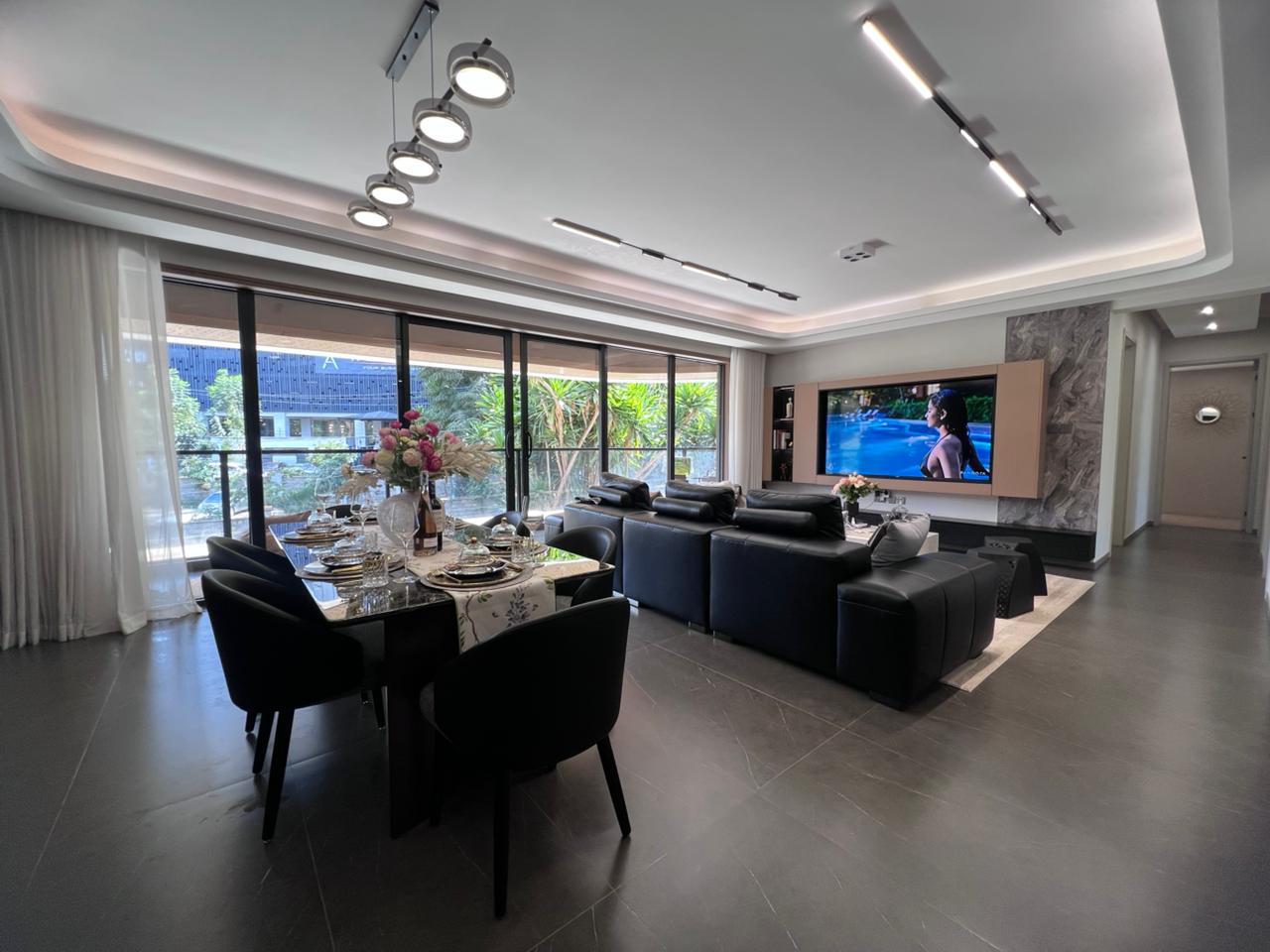 Open plan living and dining room at the family residence